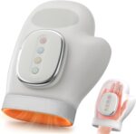 CARYWON Cordless Hand Massager in creamy white, showing a hand inserted into the device with heat and compression features.