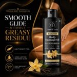 Dude's Love Organic Vanilla Body Massage Oil in a clear bottle with a pump, set against a neutral background.