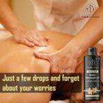 Dude's Love Organic Vanilla Body Massage Oil in a clear bottle with a pump, set against a neutral background.