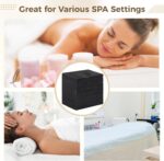 Stack of 100 black FELISTORY disposable non-woven massage table sheets, folded neatly.