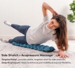 A Halo Spine Stretcher in black, designed for back pain relief with 24 massage balls visible for acupressure therapy.