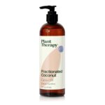 A clear bottle of Plant Therapy Fractionated Coconut Oil, 16 fl oz, with a white label, on a clean background.